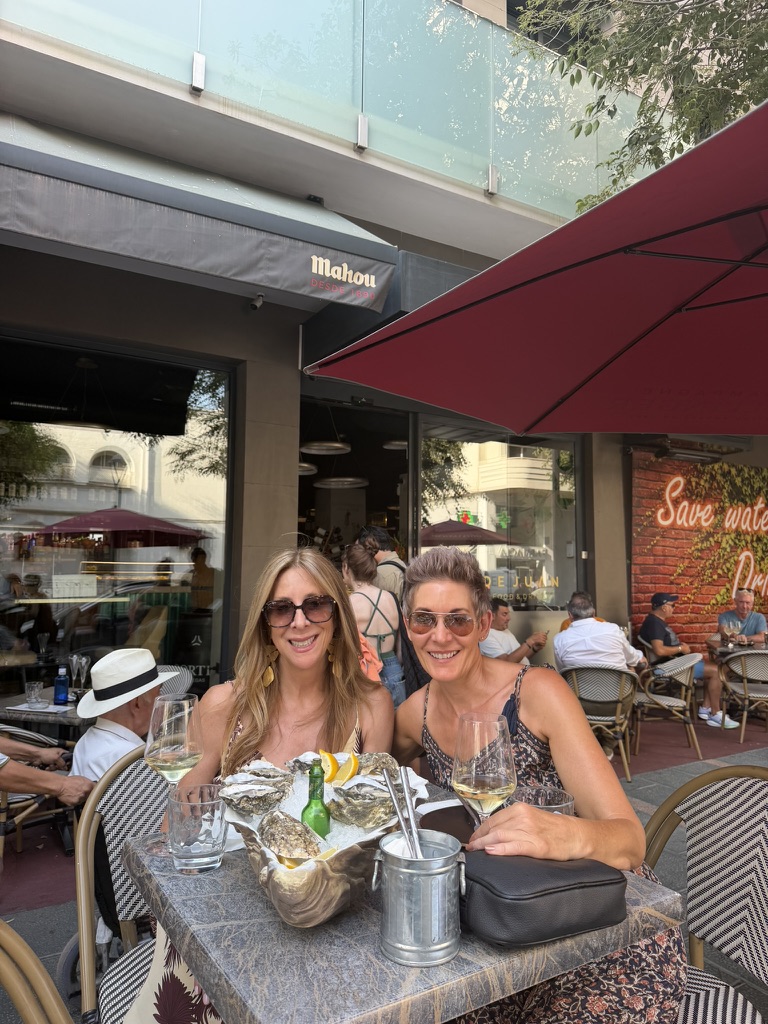 Pre-dinner oysters with a friend at De Juan Gastrobar in Marbella's Old Town